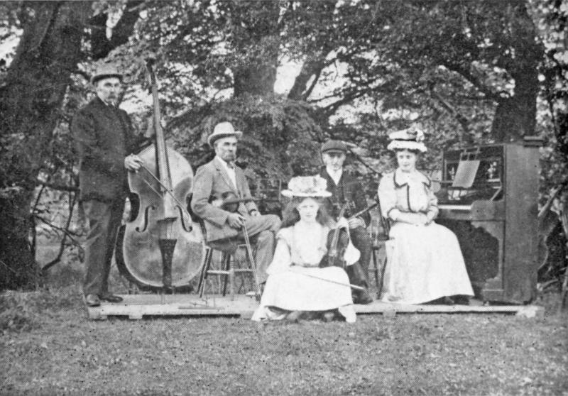 Wilson band  - c 1905.jpg - The Wilson family orchestra photographed at a Craven garden party about 1905.  All members were related and they used to cycle to playing engagements - or go by cab, and were very popular.  Music making by brass or silver bands were very widespread.   ( From Old Yorks in Pictures 1970 ) 